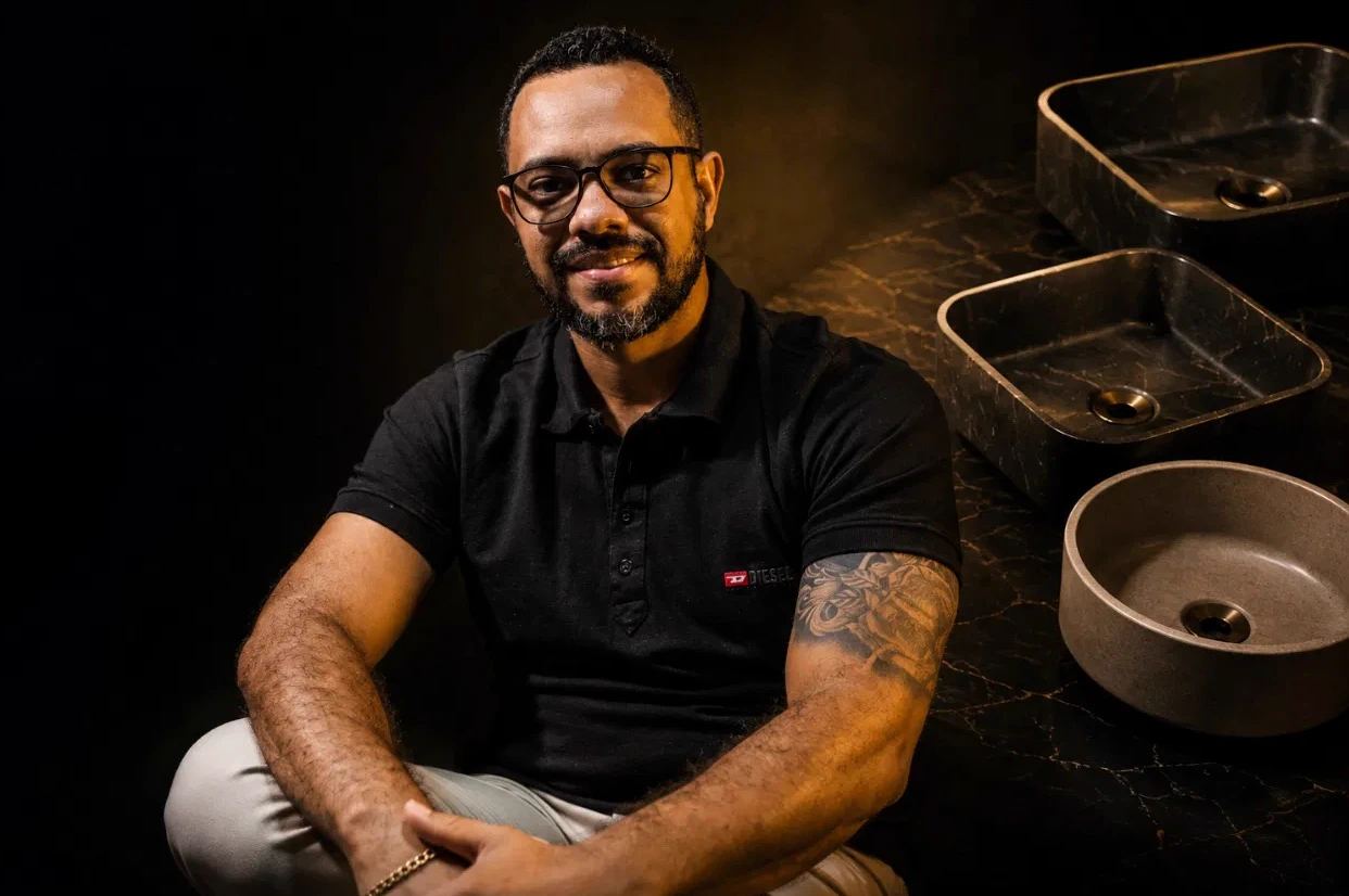 Rafael alongside different concrete sinks