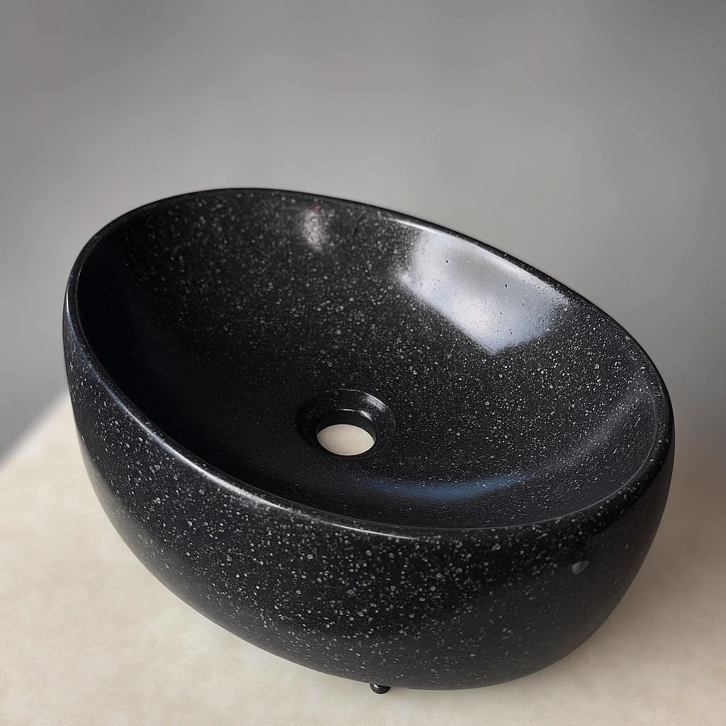 Black speckled concrete sink finish